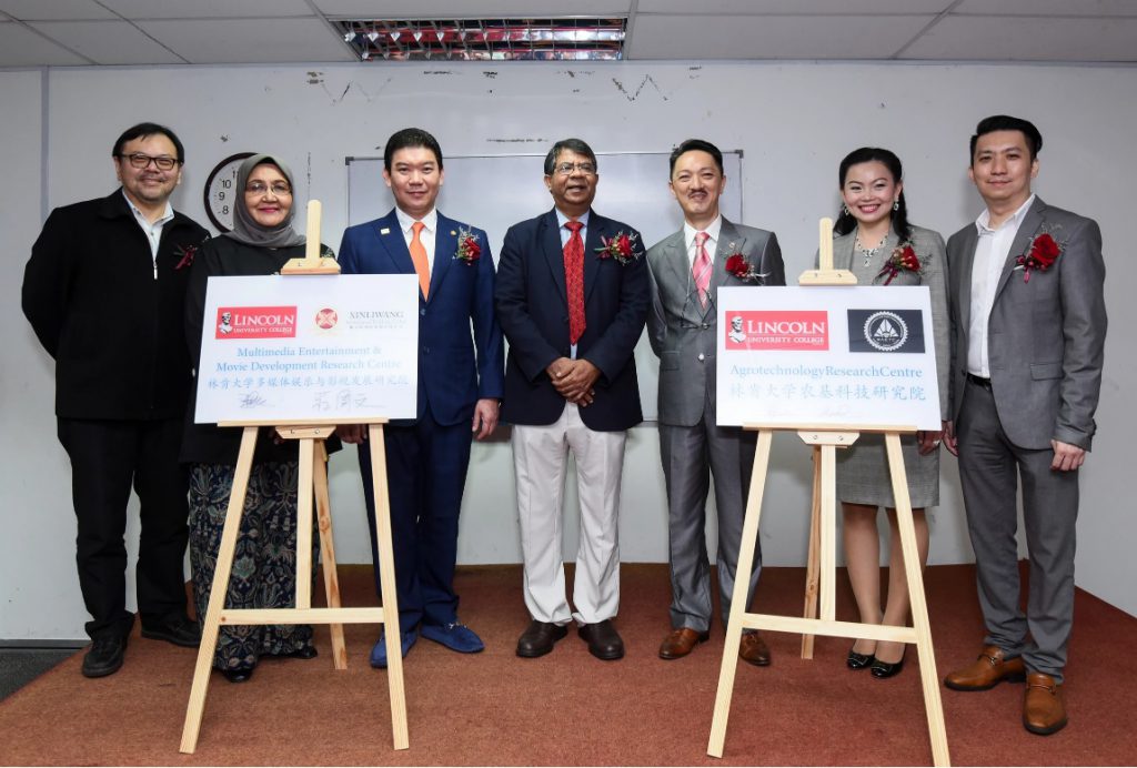 庄周文与爱新觉罗毓昊于马来西亚林肯大学成立2研究院