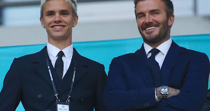 贝克汉姆父子档著西装现身球场风采胜过比赛