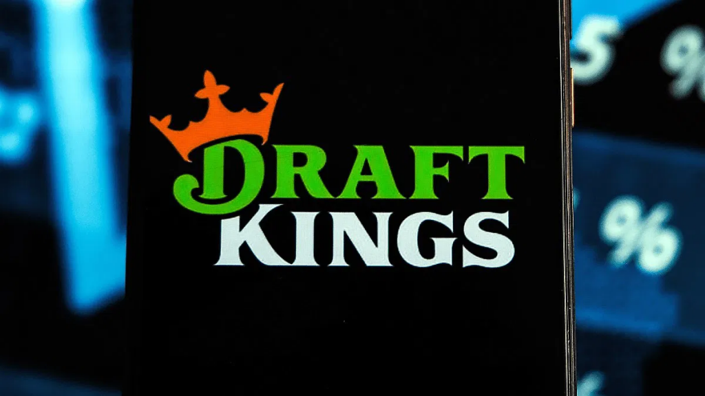 DraftKings 标志在手机屏幕上显示，象征公司进入预测市场与事件合约业务