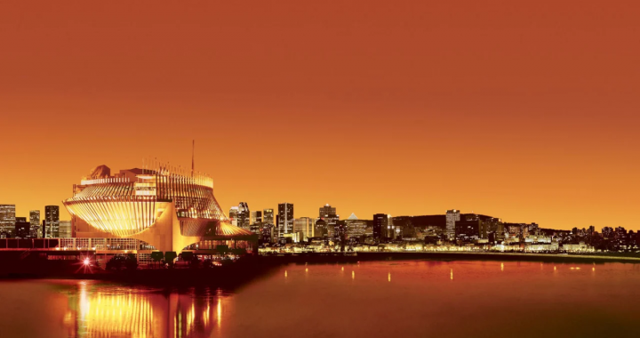 魁北克蒙特利尔夜景与赌场大楼全景图，象征Loto-Québec发展。