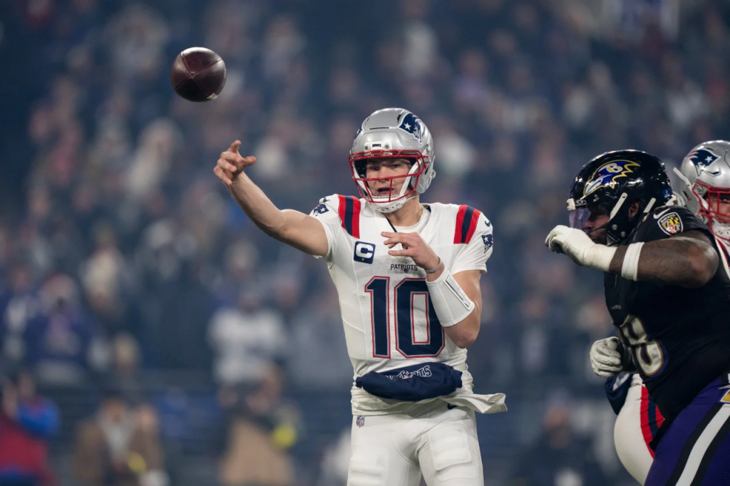 新英格兰爱国者四分卫比赛中传球画面 展现超级碗投注焦点