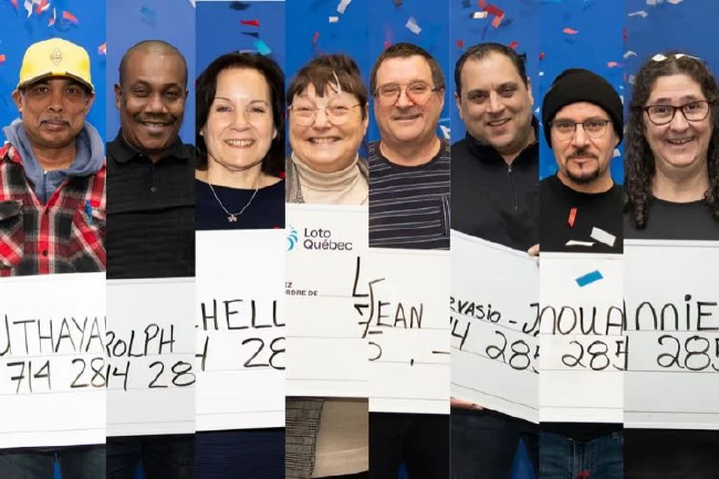 加拿大649团体购彩中奖者集体领奖合影画面