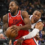 伦纳德比赛中持球对抗防守球员画面