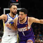 布克持球突破库里防守瞬间